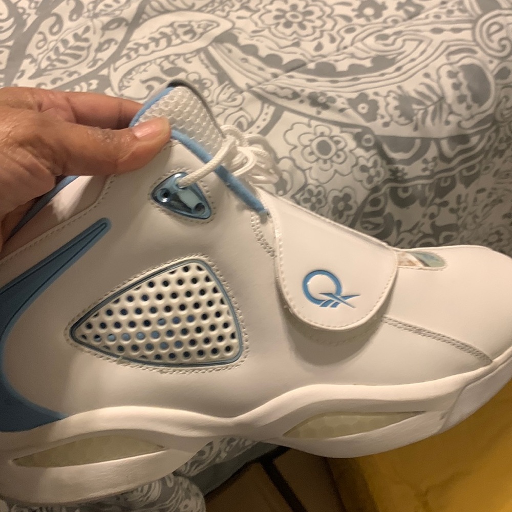 Question 111 Mens Reebok sneakers white and Carolina Blue size 11.5